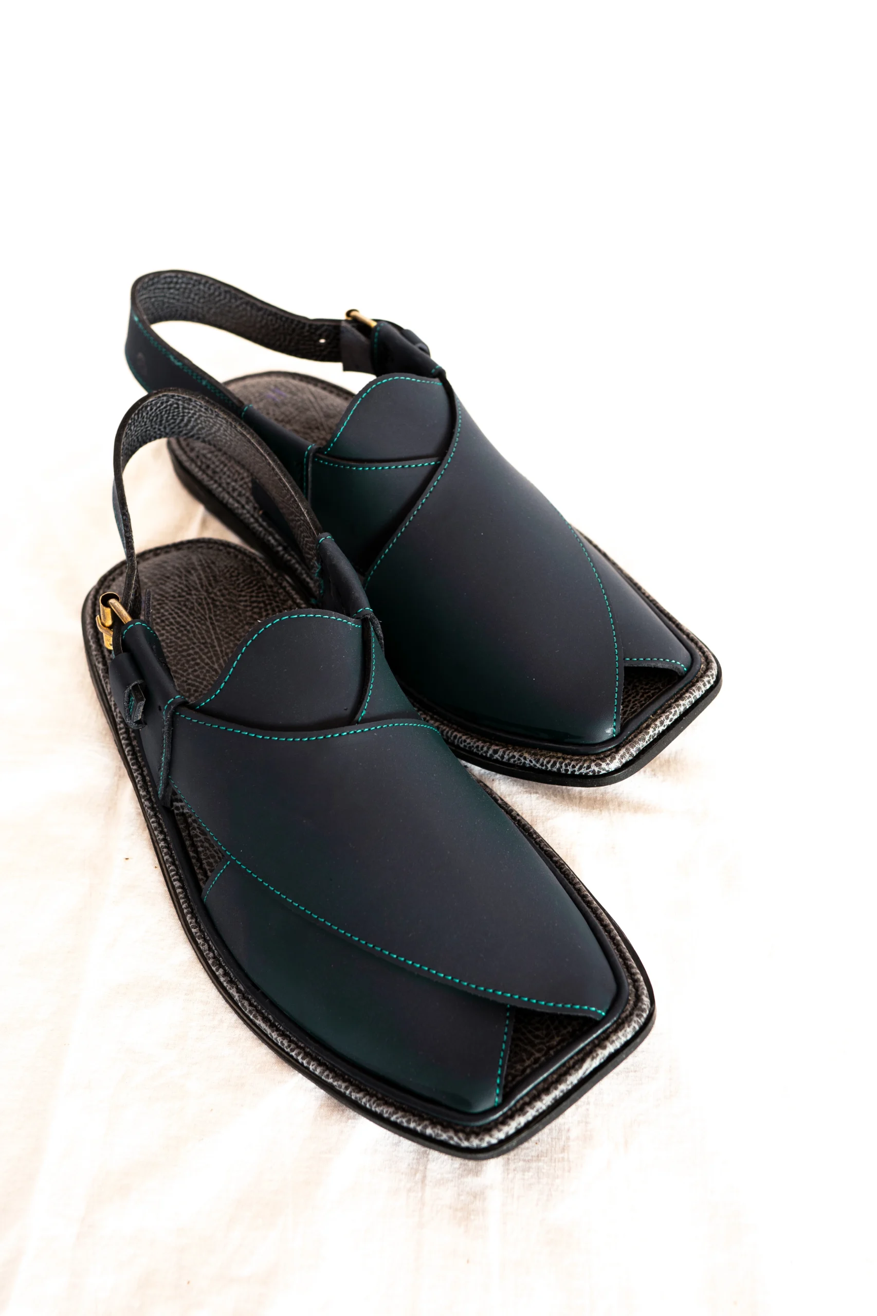 Black Zalmi chappal with teal stitching